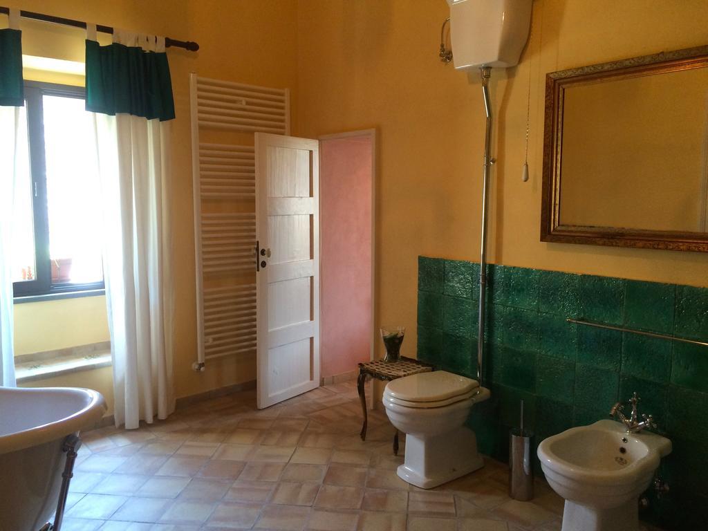 Апартаменты Palazzo Cutrufelli Graniti Номер фото